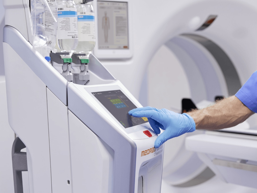 Radiologist using Medrad Centargo CT injection device